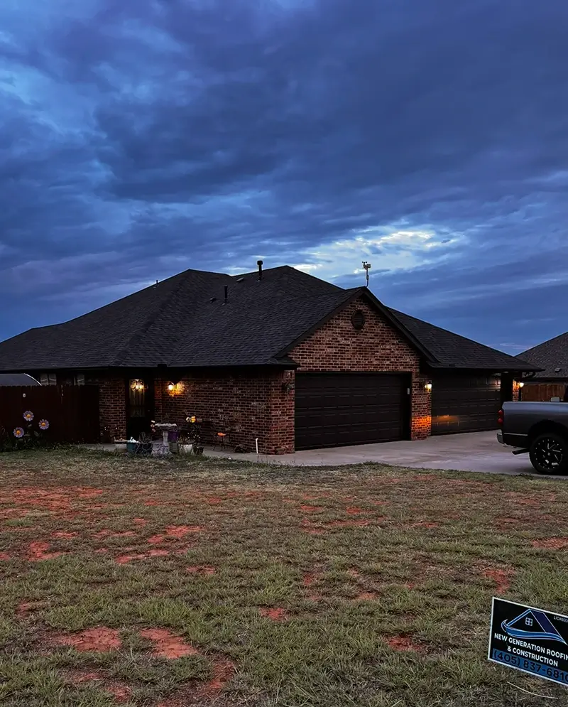 A home after its exterior was painted and roof replaced